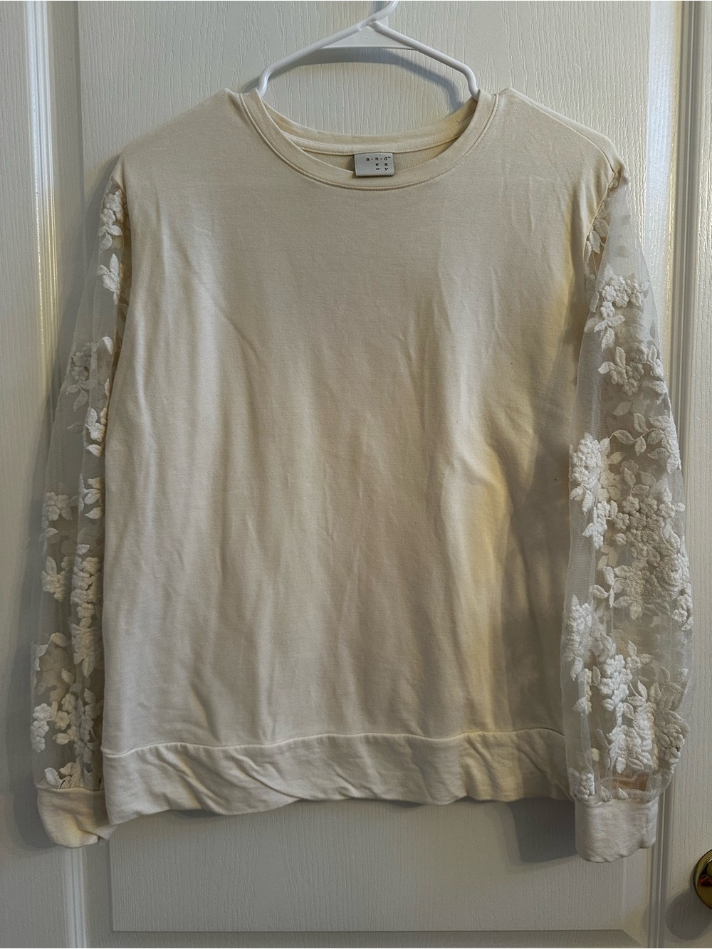 a new day cream long sleeve lace top
